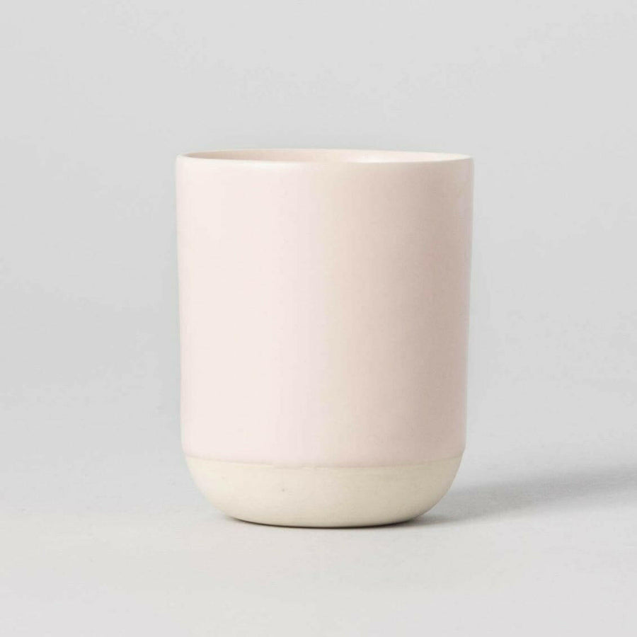Premium quality cappuccino with rich crema served in a stylish cup on a wooden table.