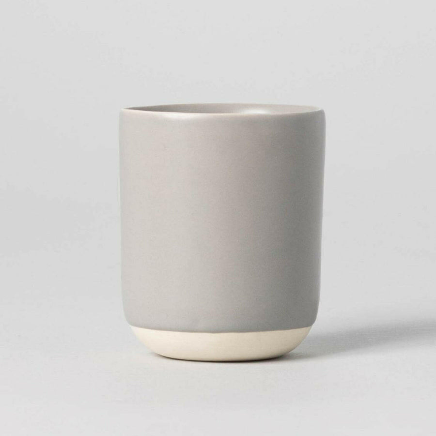 Premium quality cappuccino with rich crema served in a stylish cup on a wooden table.