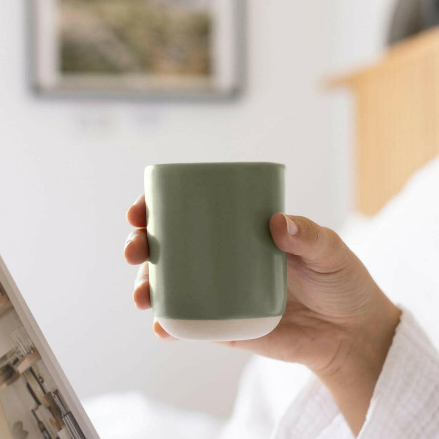 Premium quality cappuccino with rich crema served in a stylish cup on a wooden table.