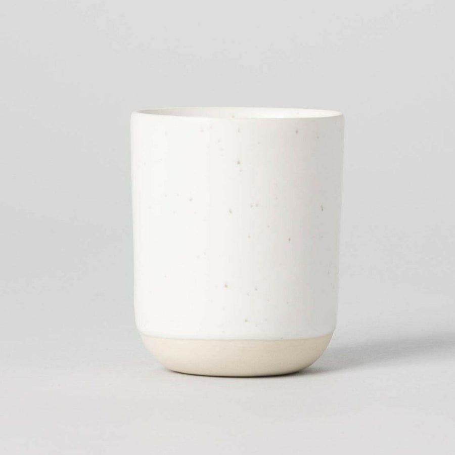 Premium quality cappuccino with rich crema served in a stylish cup on a wooden table.