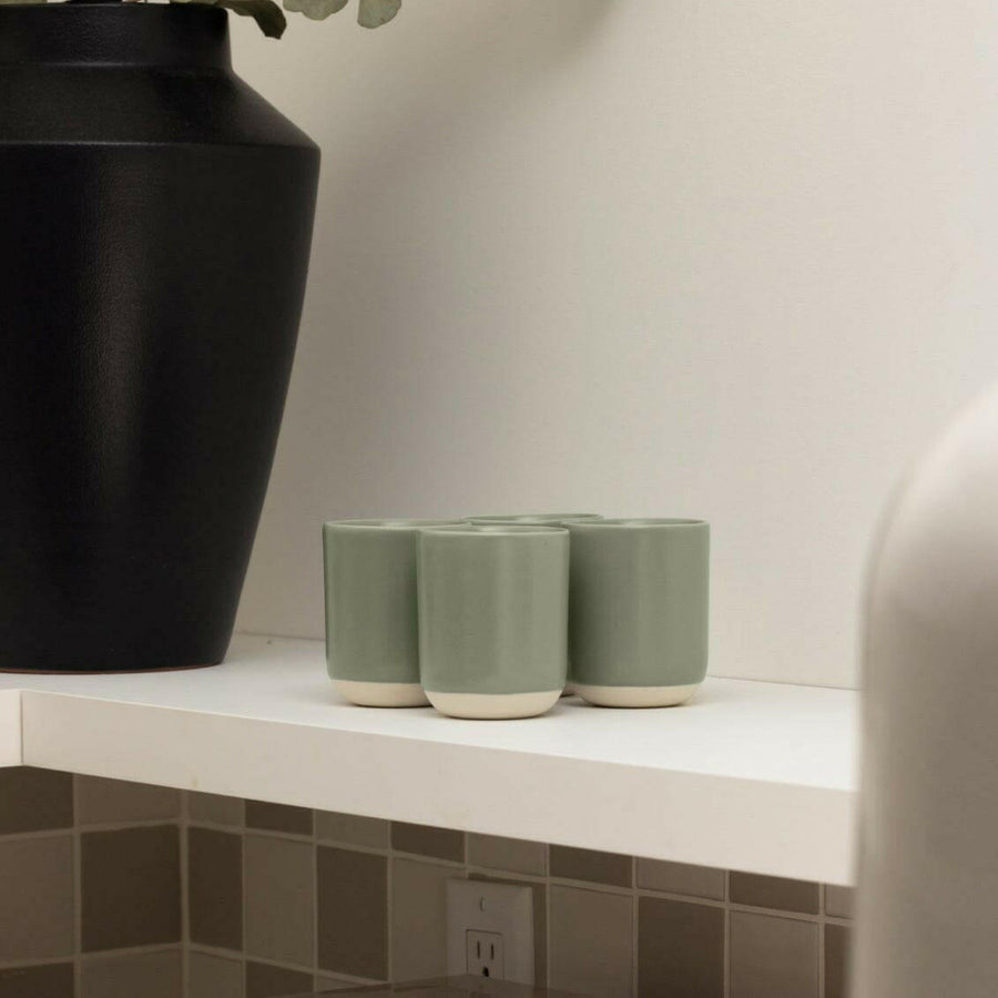 Premium quality cappuccino with rich crema served in a stylish cup on a wooden table.