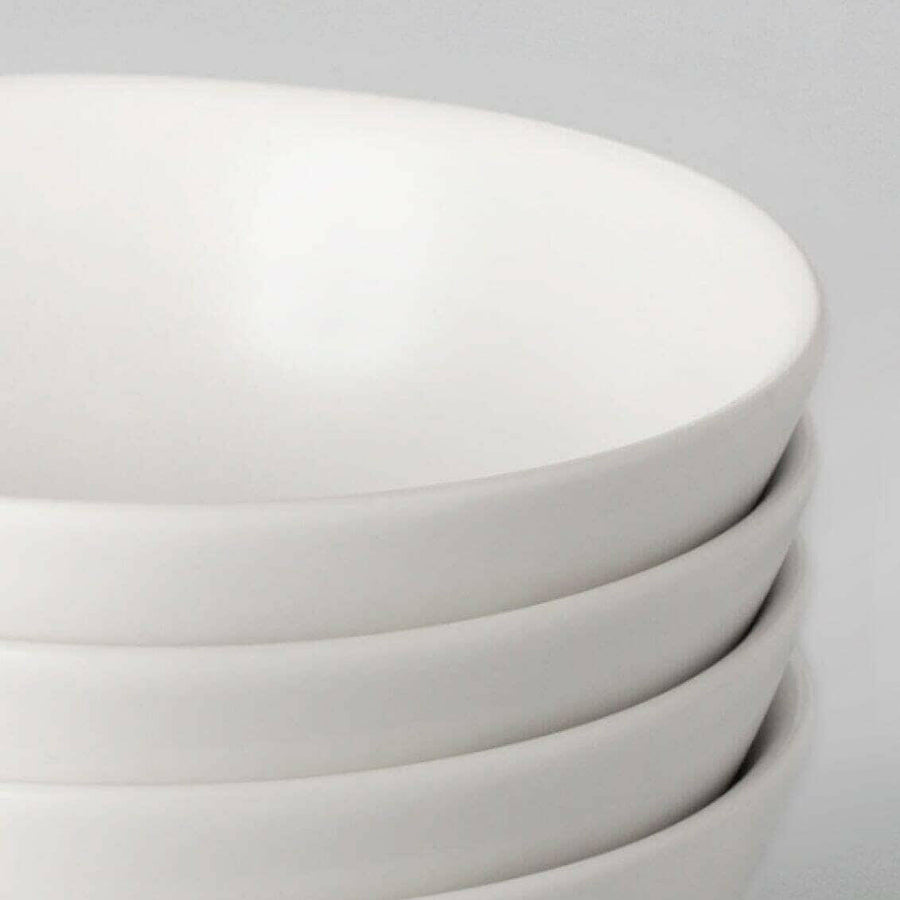 Elegant dinnerware set showcasing refined craftsmanship for sophisticated dining experiences.